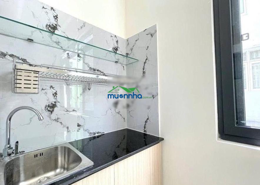 Bán nhà bùi đình túy, 4x20m 3 lầu 13 phòng cao cấp cho thuê