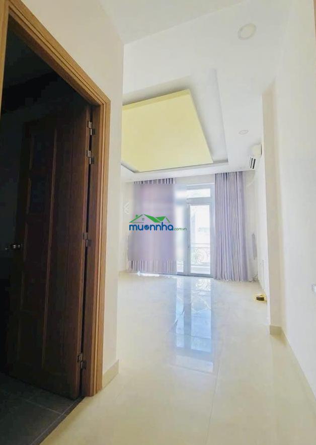 Mặt tiền đường bàn cờ 50m ra trường chinh q12 - nhà đẹp 4 tầng - dt 4m x 25m - xe tải thông - 4