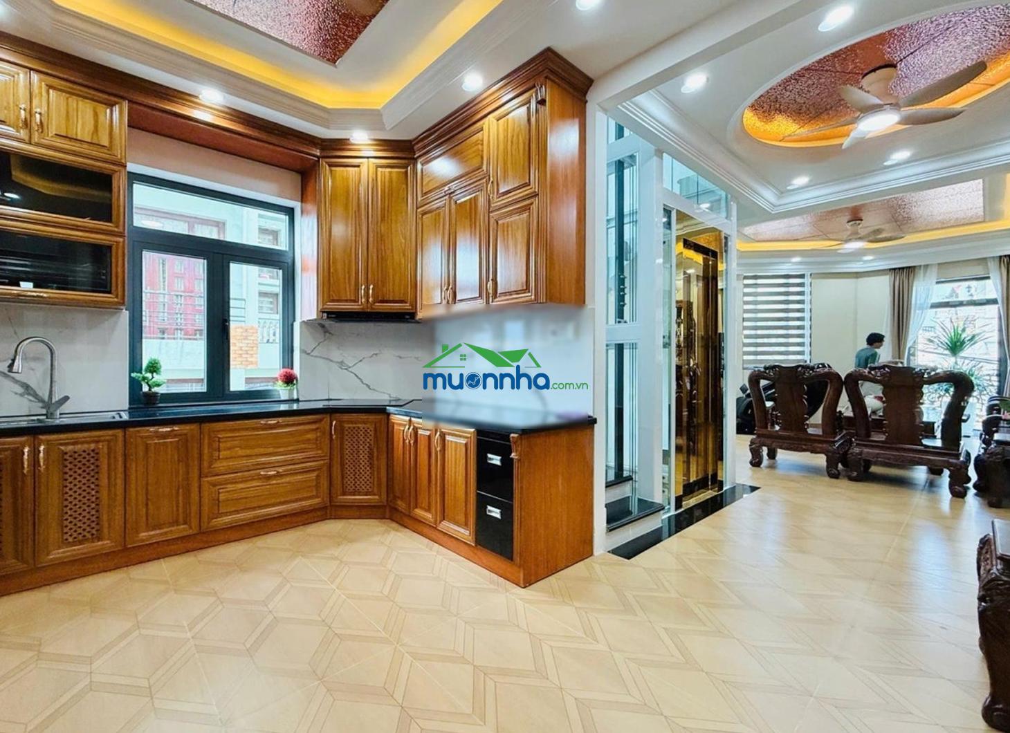 Nhà trần thái tông q. tân bình lô gốc 2 mt nở hậu 10m, 1 hầm + 5 lầu thang máy full nt, 14.98 tỷ