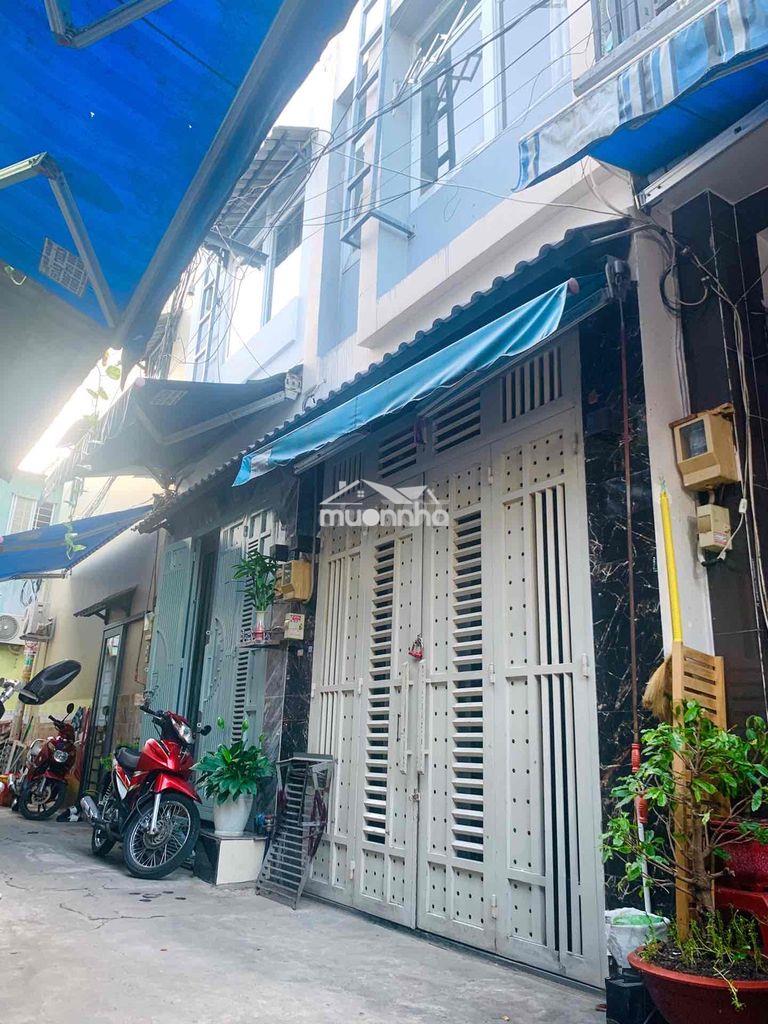 Tôi bán nhà 64 m2, 1 trệt, 1 lầu, sổ hồng, mặt tiền nhà 3 m, quận 7