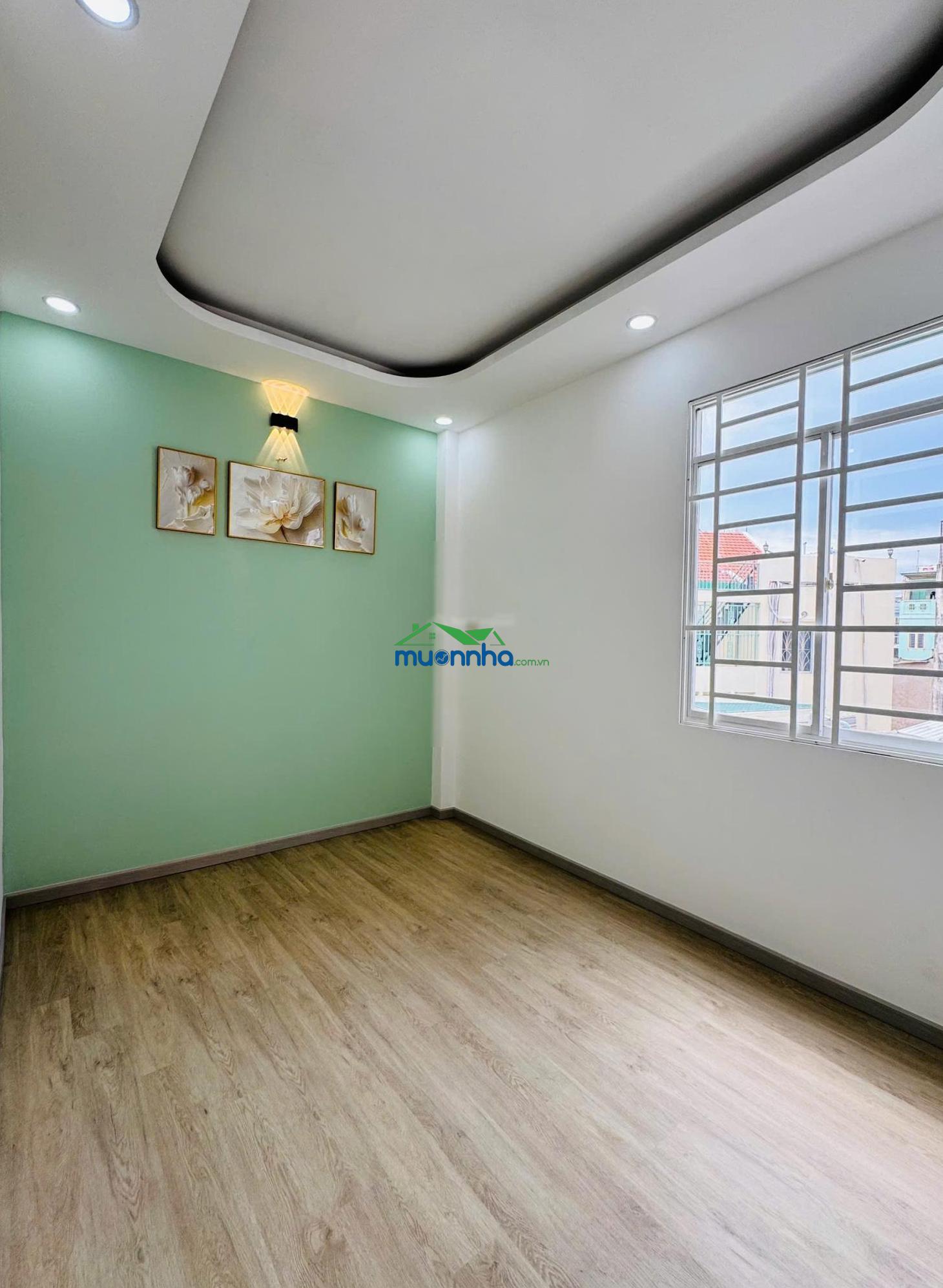 Bán nhà đẹp tại âu dương lân quận 8 ngang 6m 4 tầng 7.48 tỷ