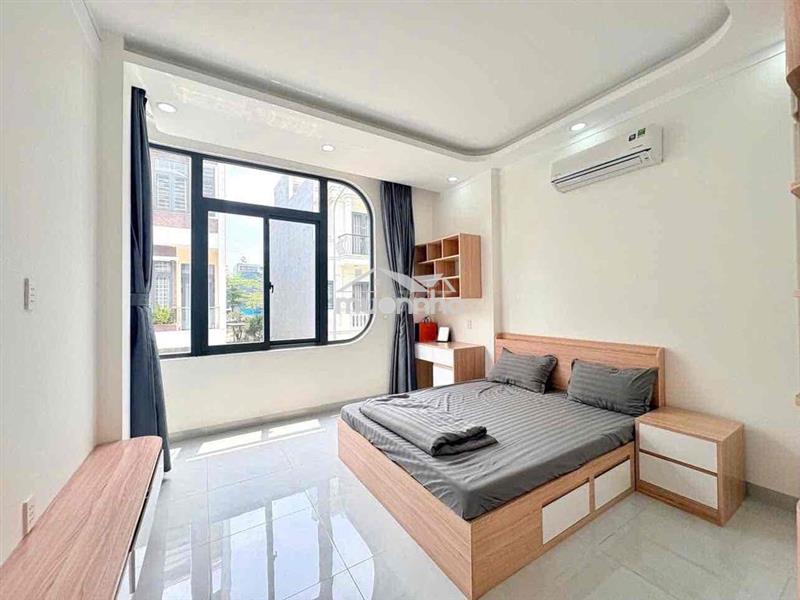 Nhà 1 trệt 2 lầu gần vsip1,kế đường 22/12, có nội thất,đường 7m ô tô