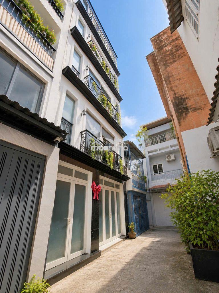 Bán nhà trần văn đang,p9,q3.dt: 5.5x8m( 5 tầng-9pn) tn :600tr/năm (6%) - 4
