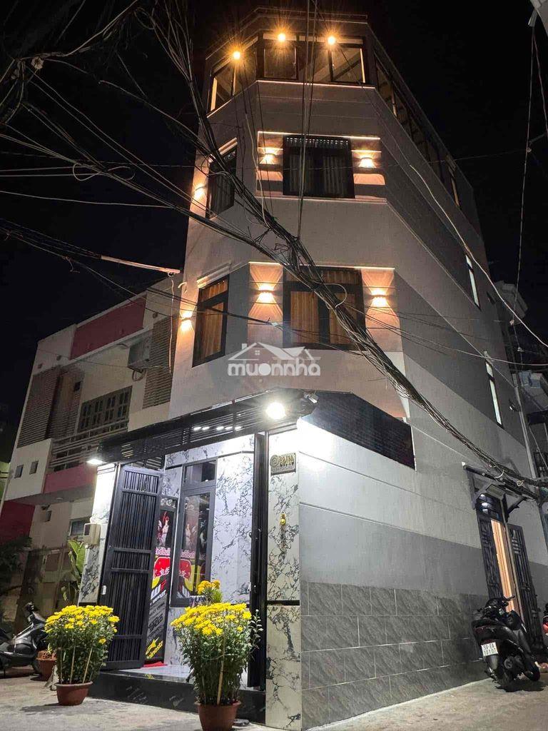 Nhà góc 2 mặt tiền hẻm xe hơi đậu trước cửa , ngay chợ gò vấp