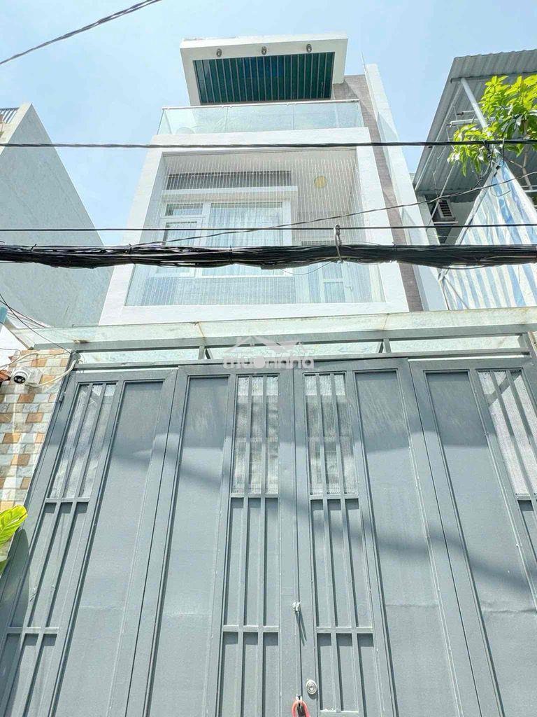 Nhà bán 65m2 kế bên coopmart quang trung, p11, gv, 4.4m x 15m - 4 lầu