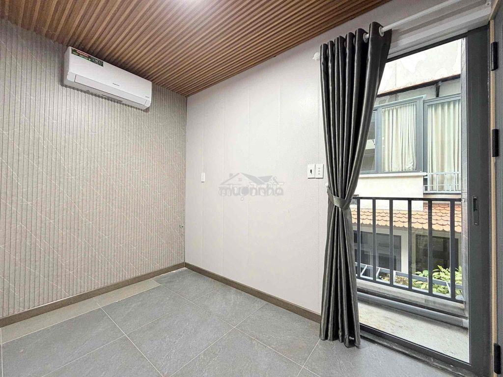 Cho thuê căn hộ 2pn1wc ban công thang máy full nt mới ở bàn cờ quận 3 - 4
