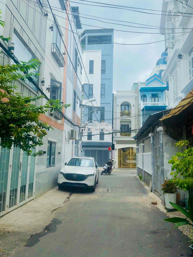 Nhà hẻm ô tô tránh, phân lô, 4 tầng 5x10, dân trí, giá rẻ, quang trung