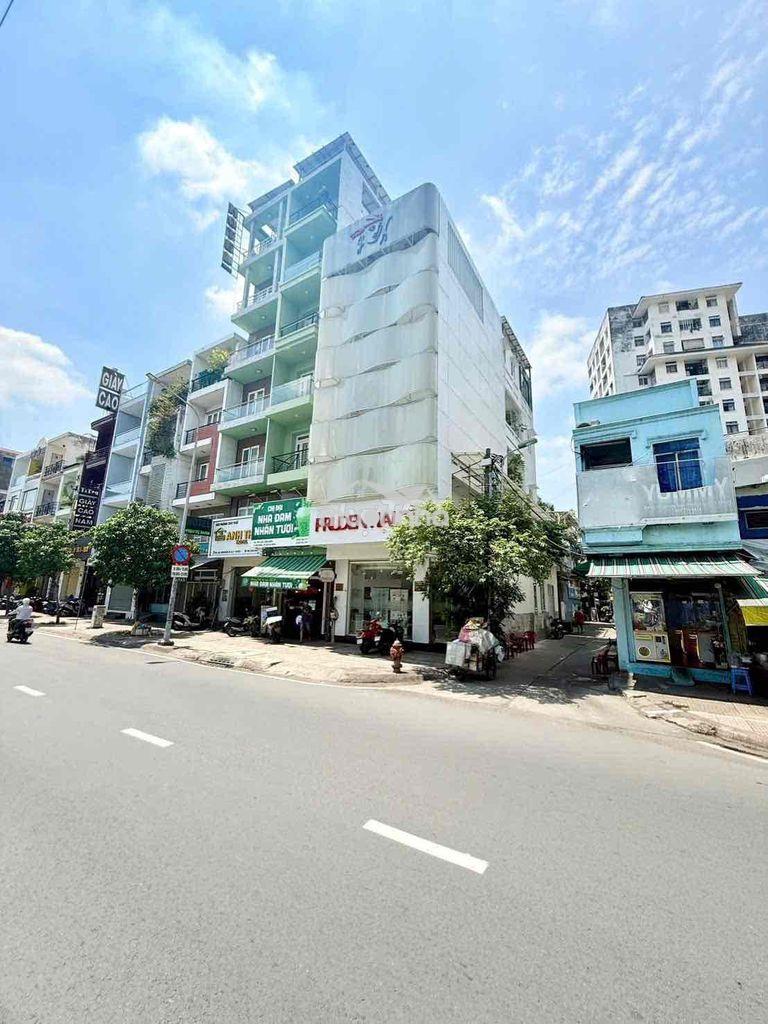 Bán toà nhà góc 2 mt lạc long quân quận 11 dt: 6,3x15 kc: 4 tầng st - 2