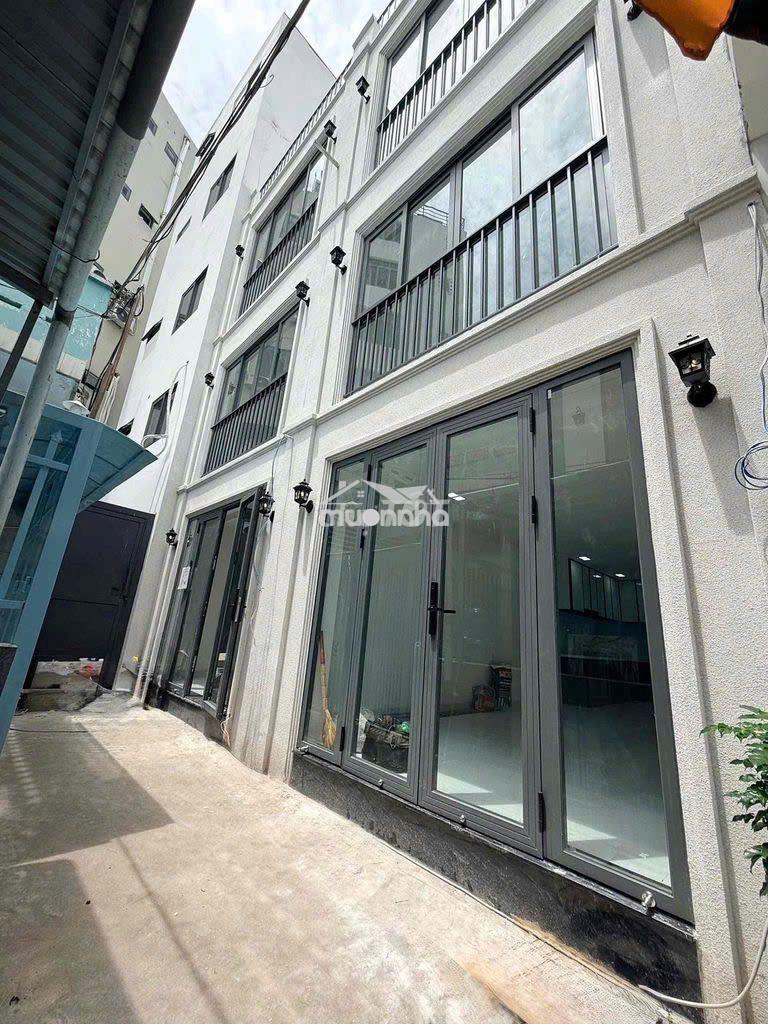 Bán nhà thạch thị thanh,tân định q1.dt:3.7x12m,4 tầng mới xây