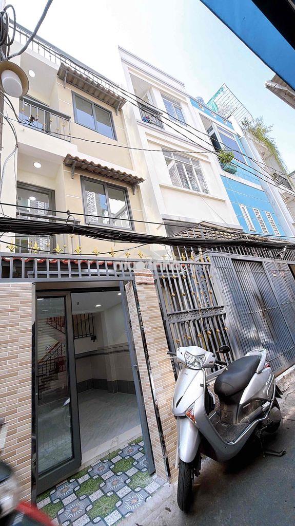 Nhà mới 100% 4 tầng 4p3wc đường hoàng diệu