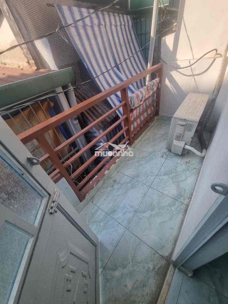 Nhà mới 1 trệt 1 lửng 1 lầu, 2pn 3vs - ngay cầu kiệu q3 - 4