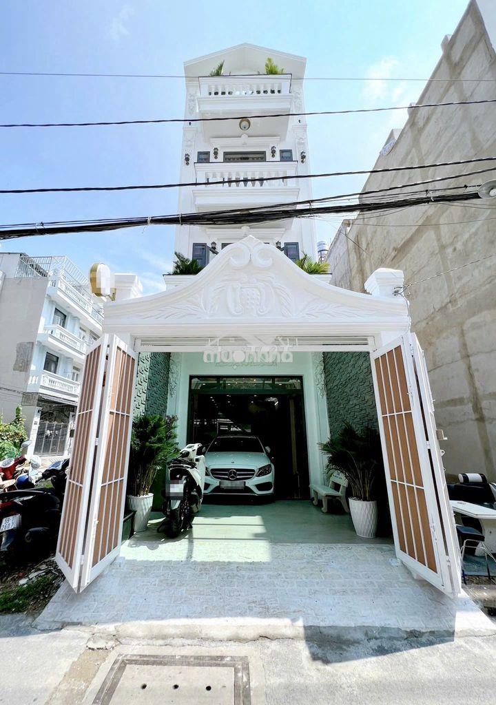 Nhà đẹp 4 tầng hẻm xe hơi huỳnh tấn phát