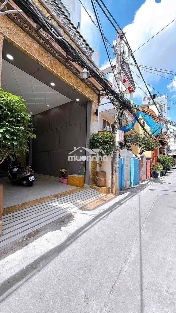 Bán nhà 4 tầng có thang máy cách mặt tiền đường xóm chiếu 30m