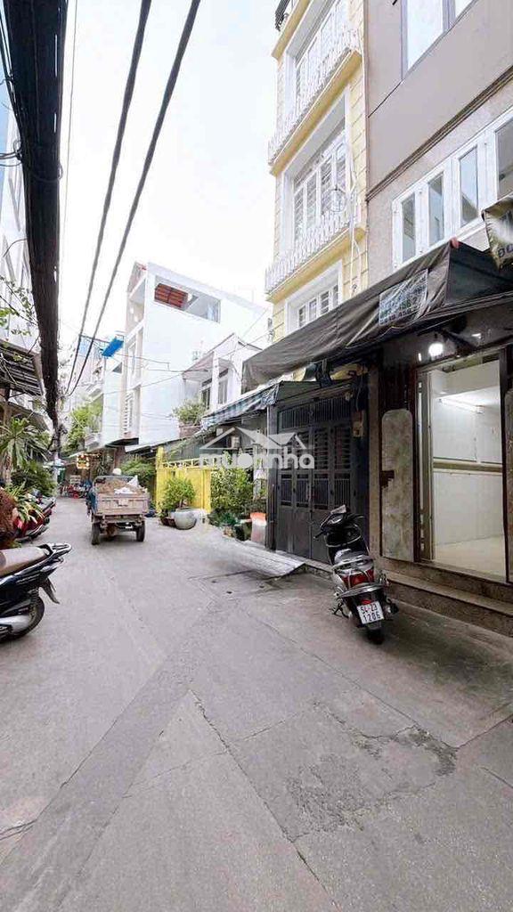 Nhà bán mt đường số q.4